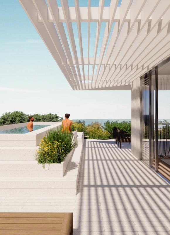 ζευγάρι σε πισίνα με θέα τη θάλασσα